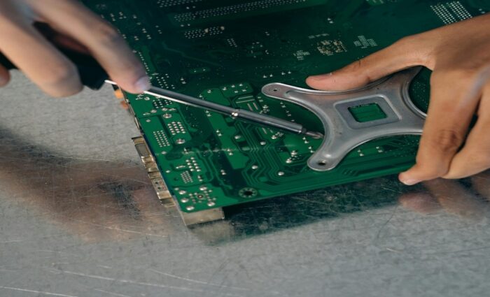 Technician providing expert laptop repair service in Hyderabad at Saikrishna Computers.